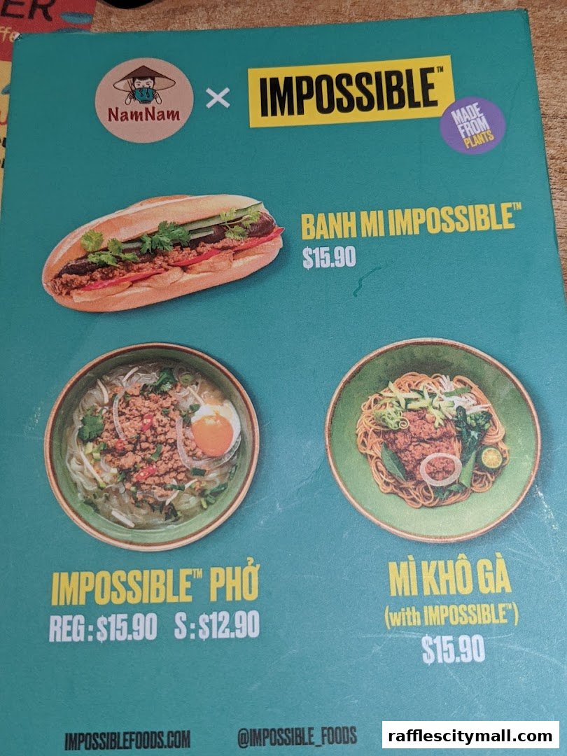 A menu featuring Impossible Foods dishes from NamNam, including Banh Mi, Pho, and Mi Kho Ga.