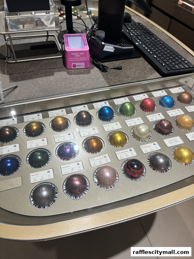 A display of Nespresso coffee capsules with labels and intensity ratings.
