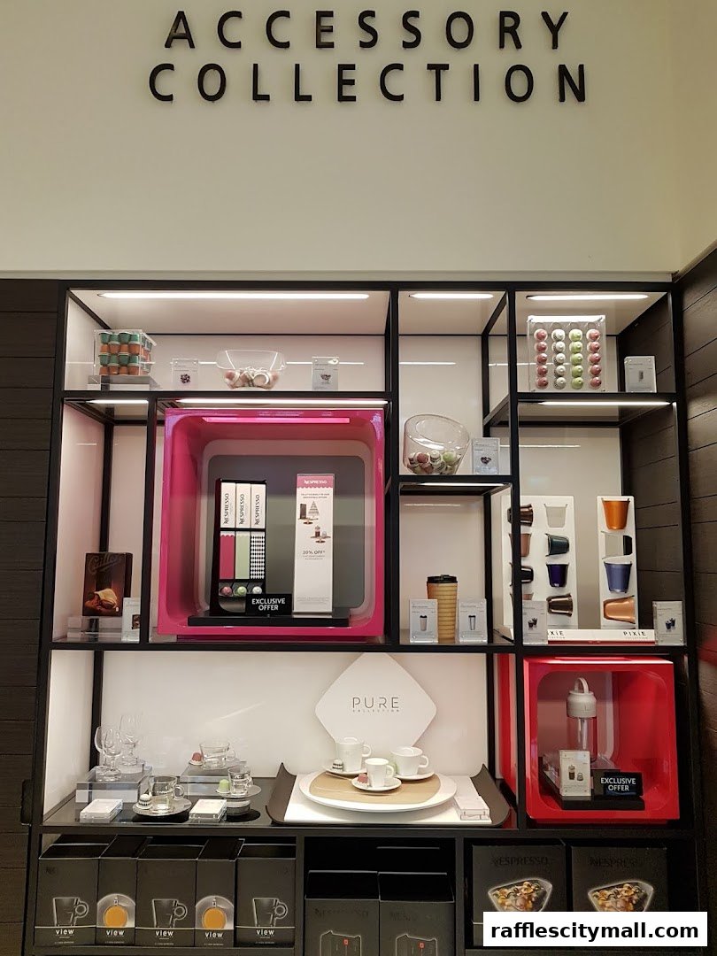 A display of Nespresso coffee machines, accessories, and coffee capsules.