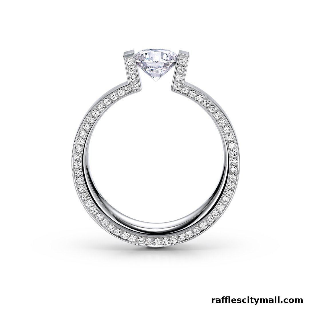 A close-up studio shot of a diamond engagement ring with a solitaire diamond and a band encrusted with smaller diamonds.