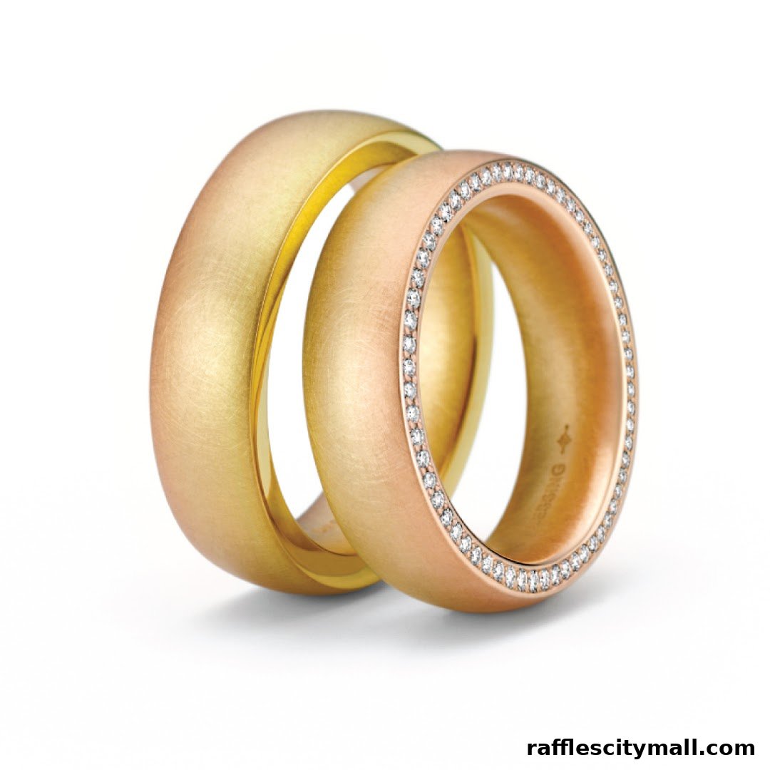 Two elegant wedding rings, one gold and one rose gold with diamonds, displayed against a white background.