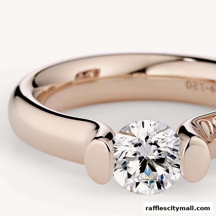 A close-up shot of a rose gold ring with a large, sparkling diamond.