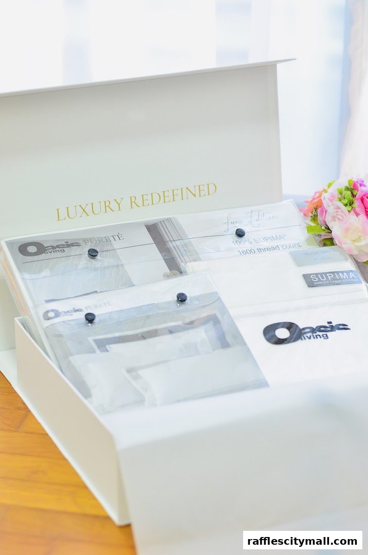 A white box displaying luxury bedding sets from Oasis Living.