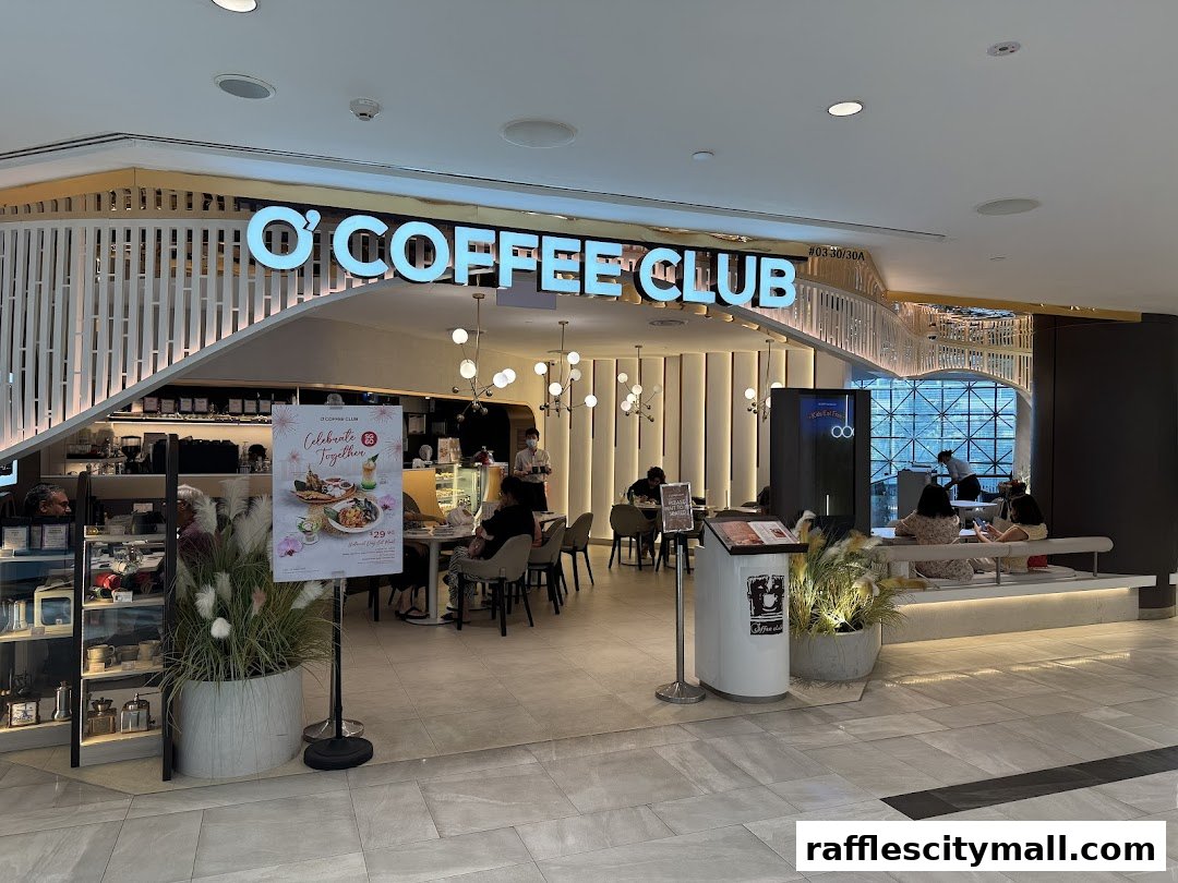 The exterior of O'Coffee Club Raffles City, showcasing its modern interior and seating areas.