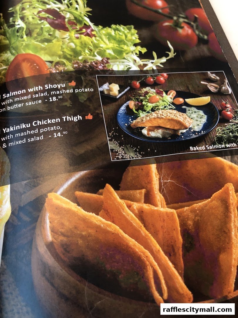 A menu page featuring delicious salmon and chicken dishes with side salads.