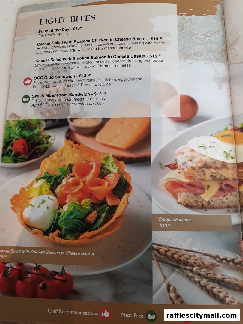 A menu page from OCoffee Club Raffles City featuring light bites and sandwiches.