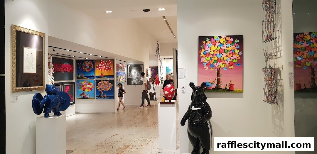 Interior view of an art gallery with colorful paintings and sculptures on display.