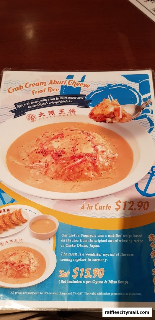 A menu featuring Osaka Ohsho's Crab Cream Aburi Cheese Fried Rice and a set meal.