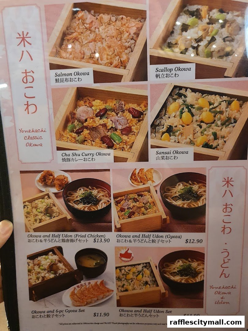 A menu showcasing various Japanese rice dishes and udon noodle sets with accompanying side dishes.