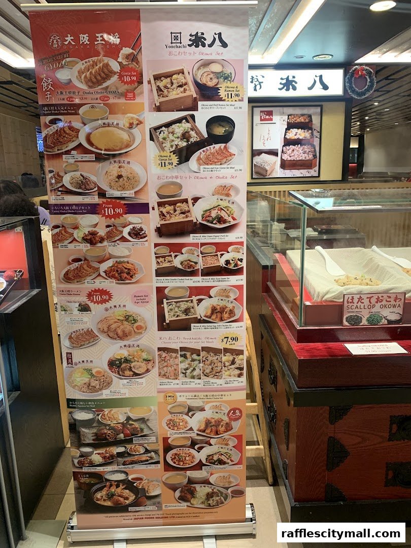 A display banner showcasing various Japanese food sets and dishes from Osaka Ohsho and Yonehachi.