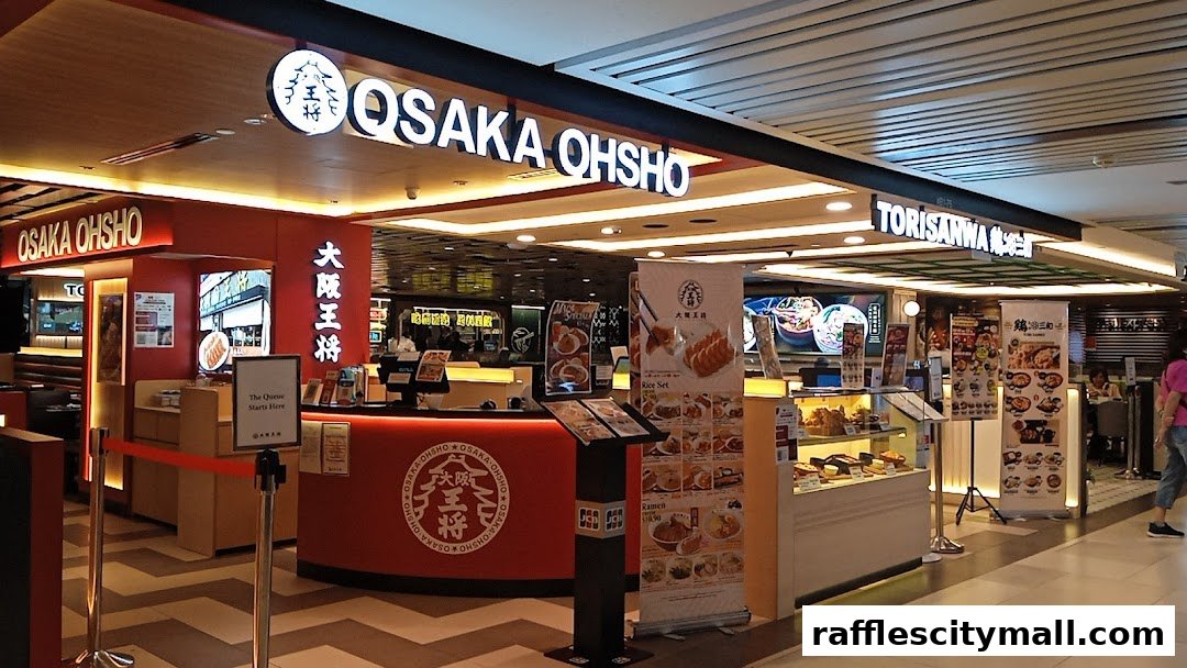 The exterior of the Osaka Ohsho restaurant, featuring its prominent signage and a display of food items.