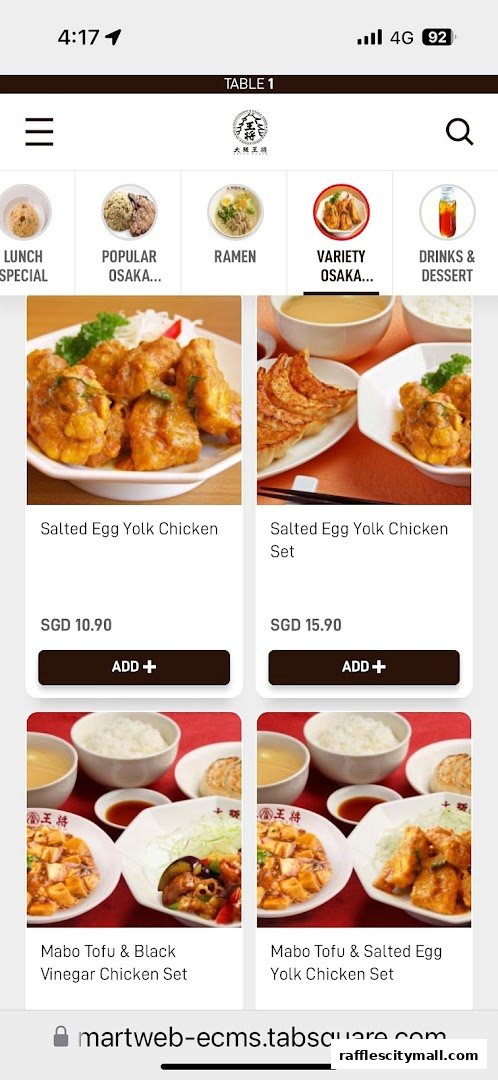 A digital menu displaying various Japanese dishes with images and prices.