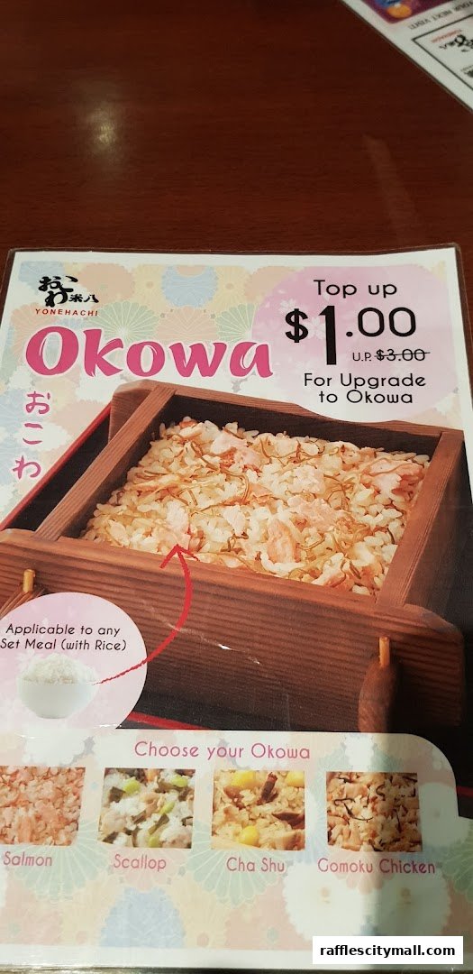 A menu featuring Okowa rice dishes with various topping options and a special upgrade price.