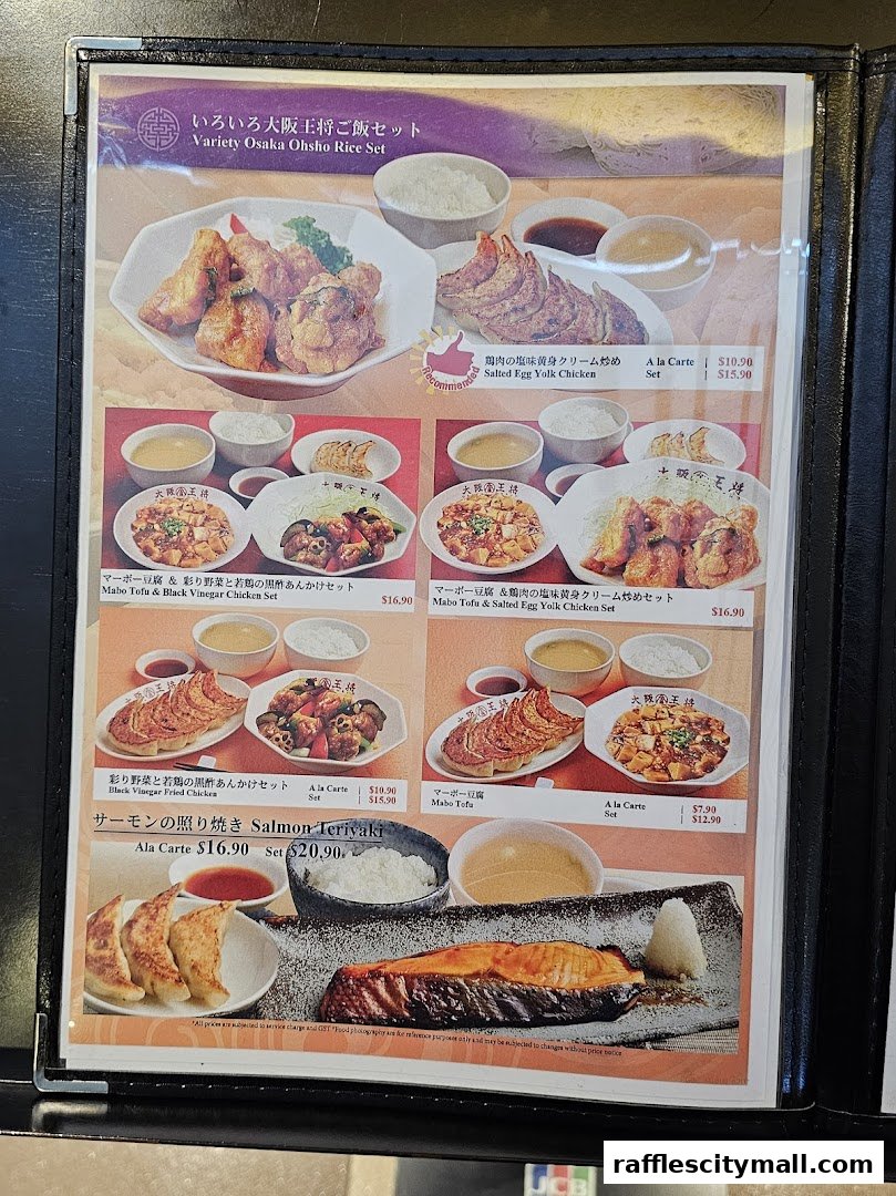 A menu from Osaka Ohsho featuring various rice sets with Japanese dishes like fried chicken and salmon teriyaki.