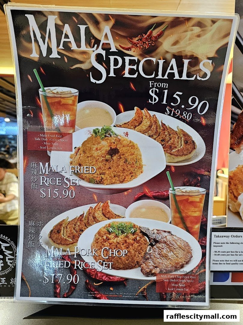 A menu board showcasing Mala Specials, featuring fried rice sets with gyoza and drinks.