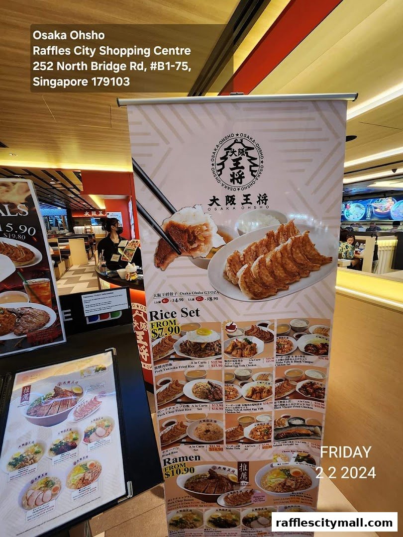 A menu display for Osaka Ohsho featuring gyoza, rice sets, and ramen.