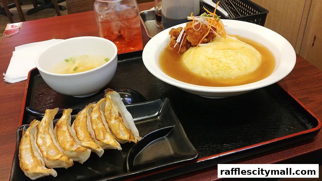 A delicious meal featuring omurice, gyoza, and soup from Osaka Ohsho.