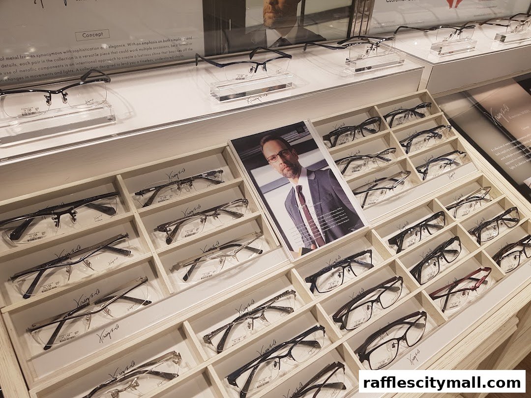 A display of various eyeglasses in a retail shop, showcasing different styles and frames.