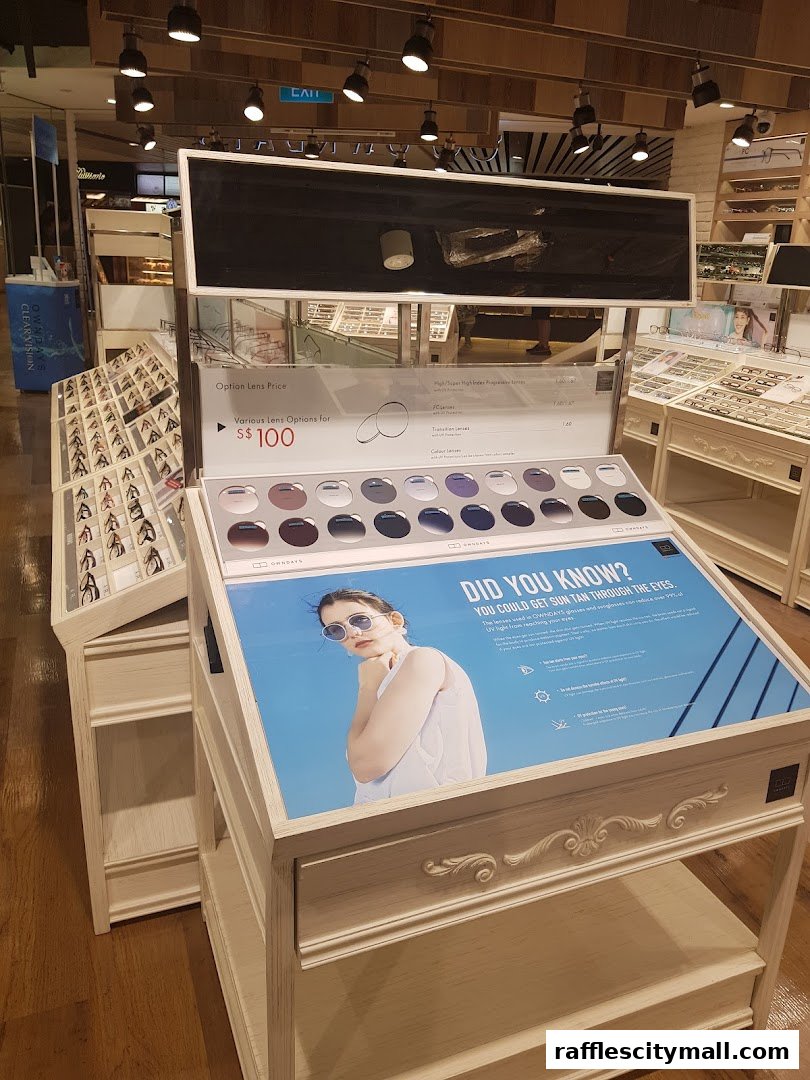 Display of various lens options and eyewear at OWNDAYS Raffles City.