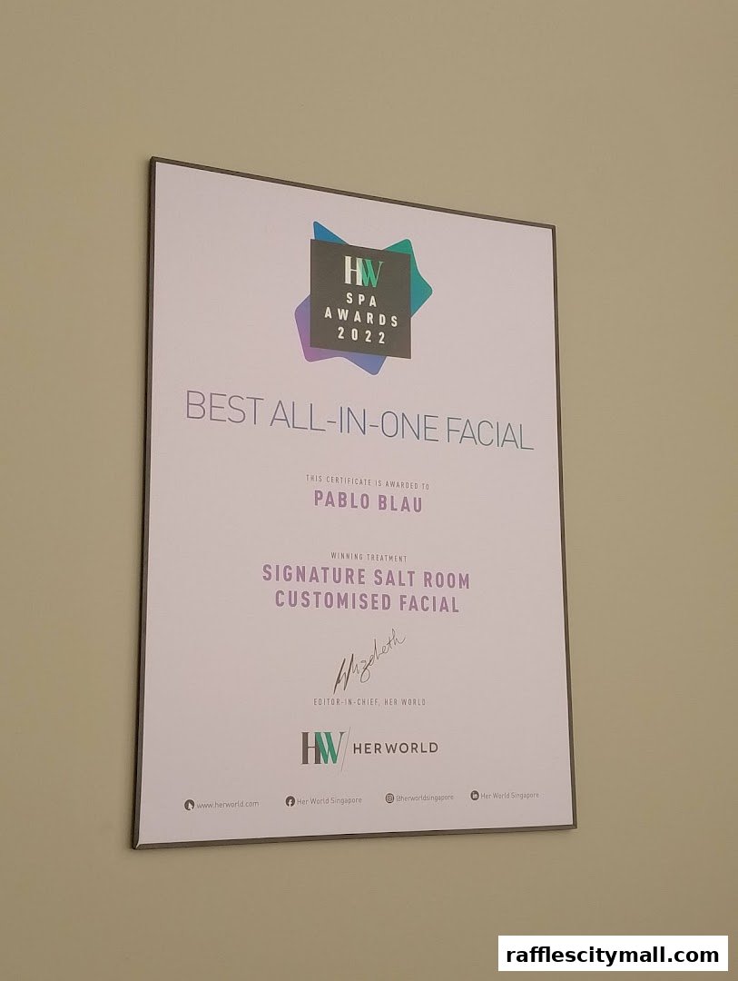 A framed certificate awarding Pablo Blau 'Best All-In-One Facial' at the HW Spa Awards 2022.