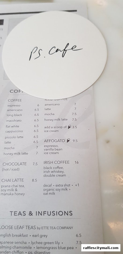 A menu from PS.Cafe Raffles City featuring coffee, chocolate, chai, and teas.