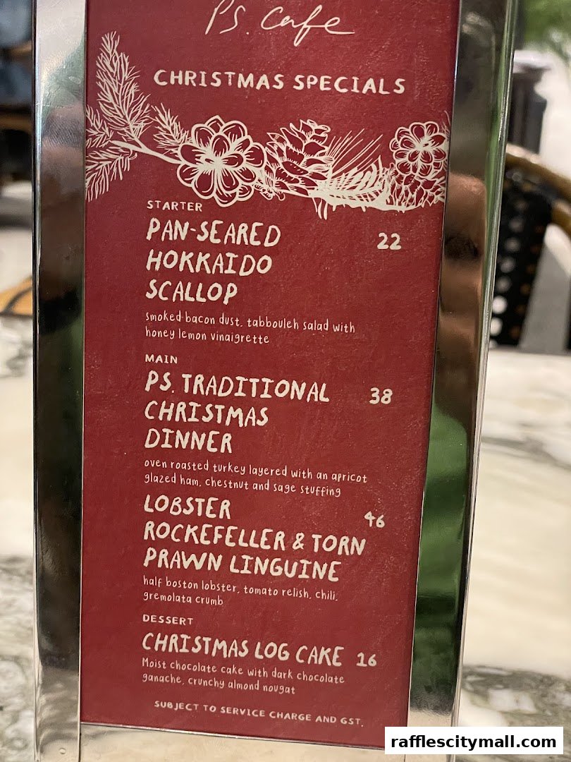 A menu featuring Christmas specials from PS.Cafe, including starters, mains, and desserts.