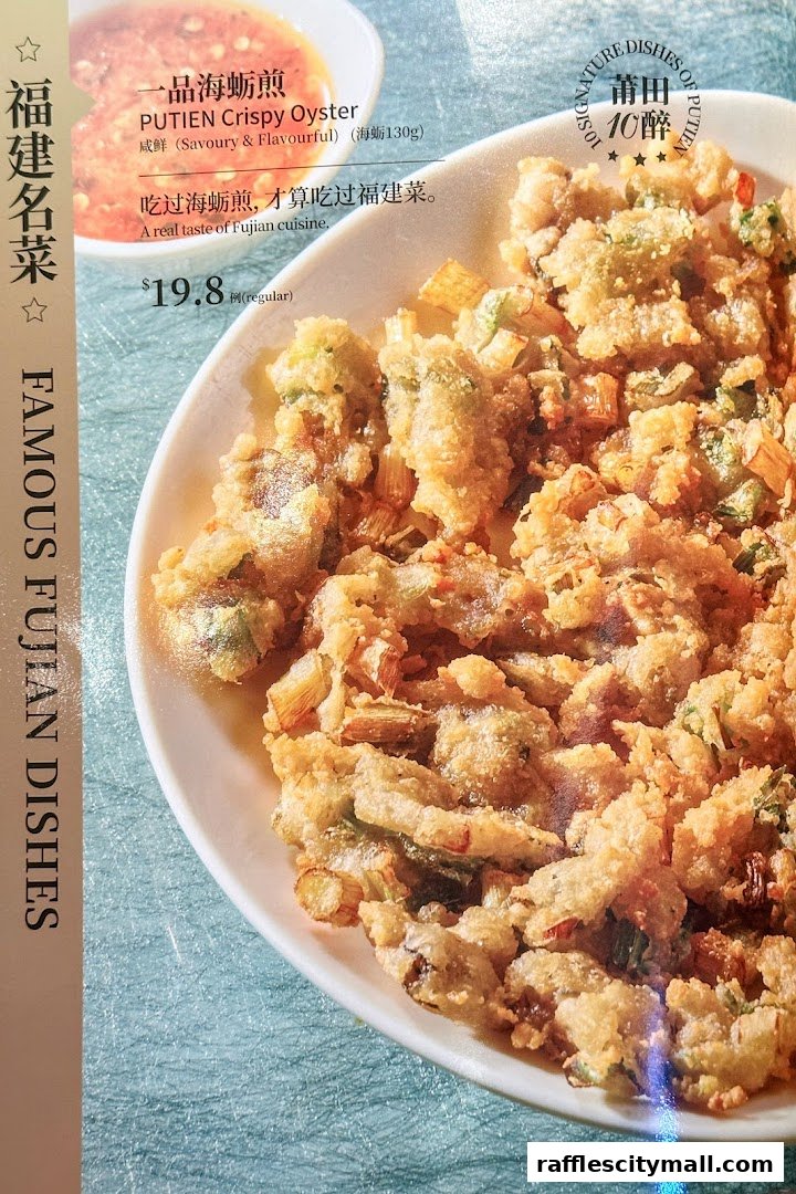 A close-up of PUTIEN Crispy Oyster, a Fujian dish, with its price and description.