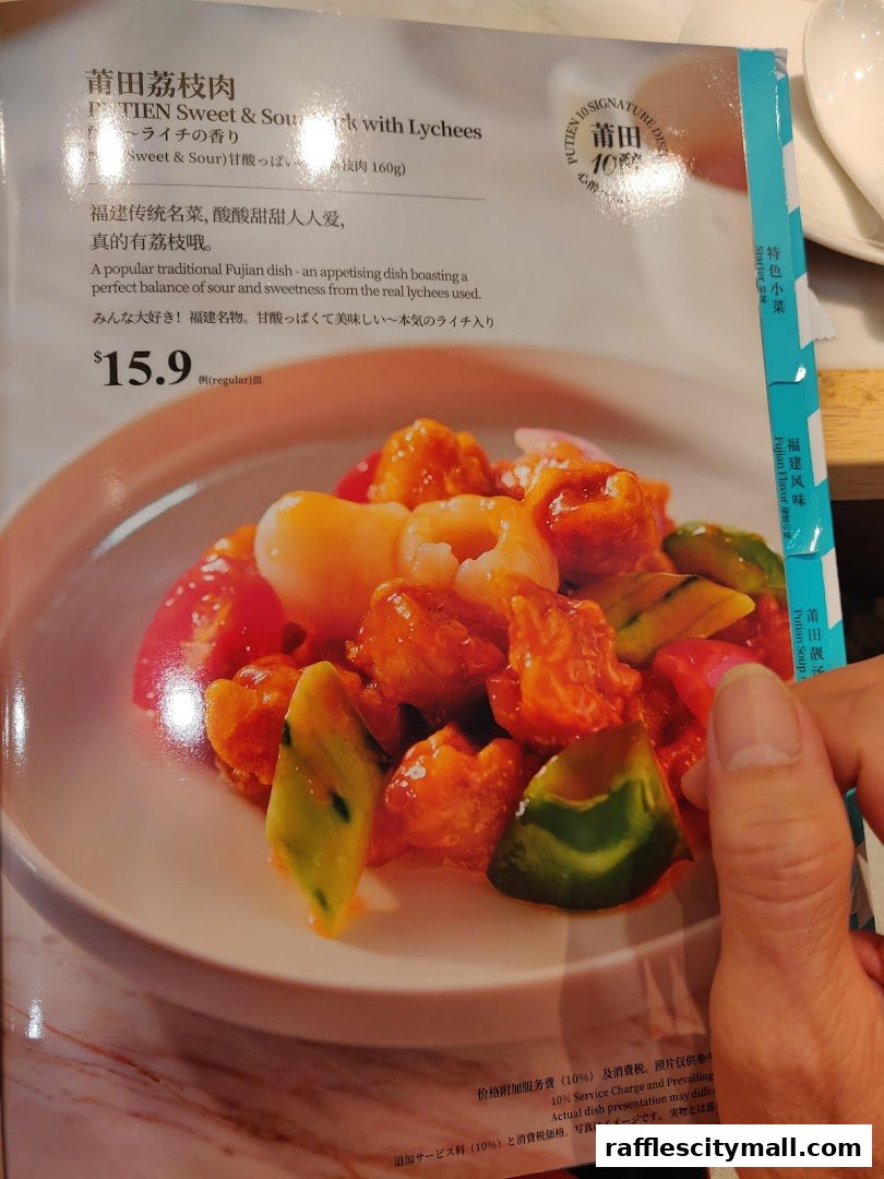 A menu item from PUTIEN featuring Sweet & Sour Pork with Lychees.