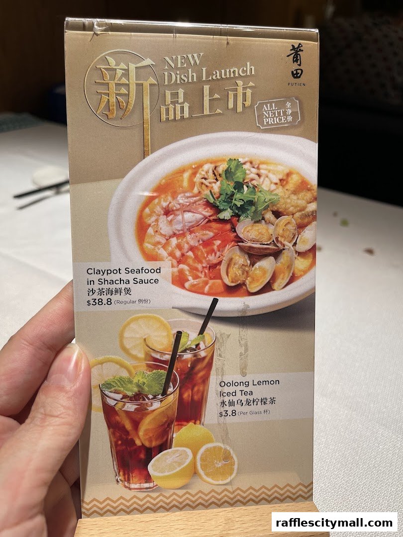 A menu featuring a new dish launch of Claypot Seafood in Shacha Sauce and Oolong Lemon Iced Tea.