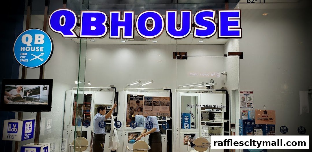 The exterior of QB HOUSE, a hair salon, with staff visible inside and signage.