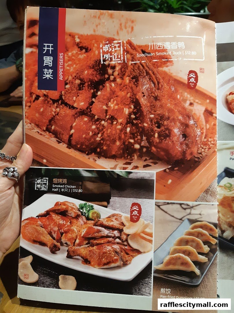 A menu featuring Szechuan Smoked Duck, Smoked Chicken, and Pan-fried Dumplings.