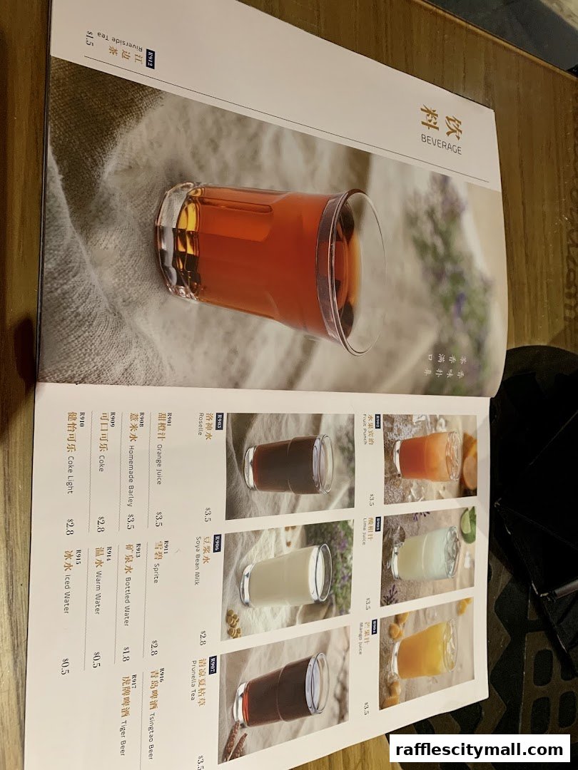 A menu page showcasing various beverages with accompanying images and prices.