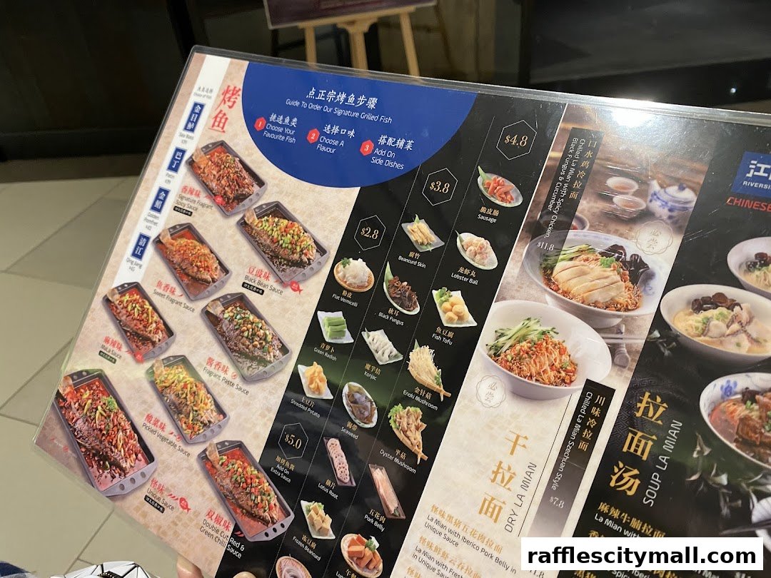A menu featuring various grilled fish dishes, noodles, and side dishes with prices.