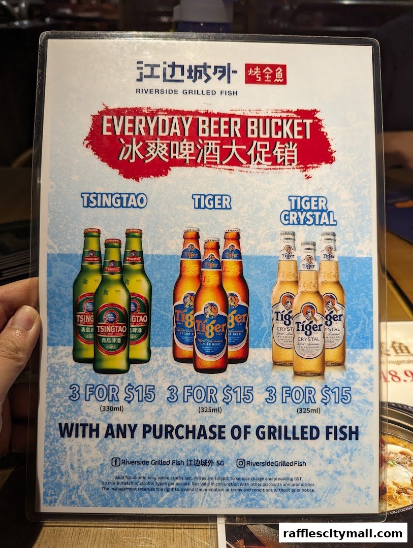A menu promoting an everyday beer bucket special with Tsingtao and Tiger beers.