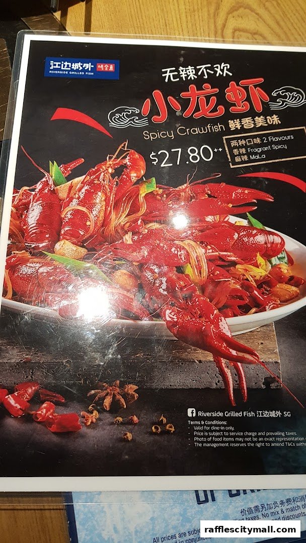 A menu featuring a large serving of spicy crawfish with chili and star anise.