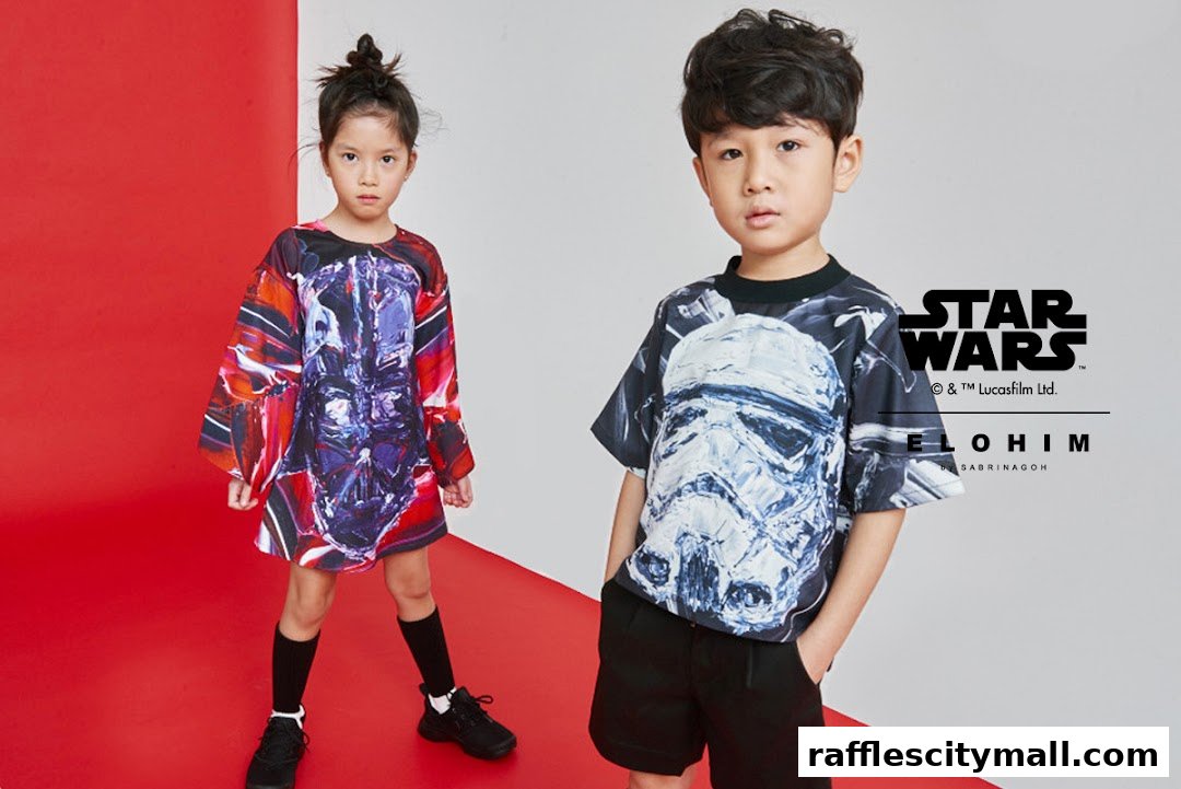 Two children modeling Star Wars themed clothing from SABRINAGOH Raffles City.