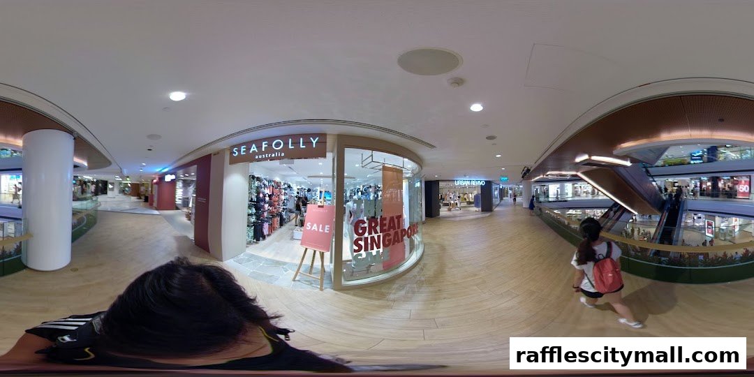 Seafolly Australia store entrance with sale signage and clothing displays.