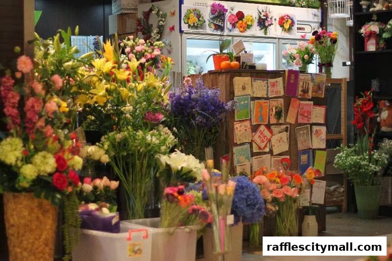 A vibrant flower shop interior filled with a wide variety of fresh blooms and greeting cards.