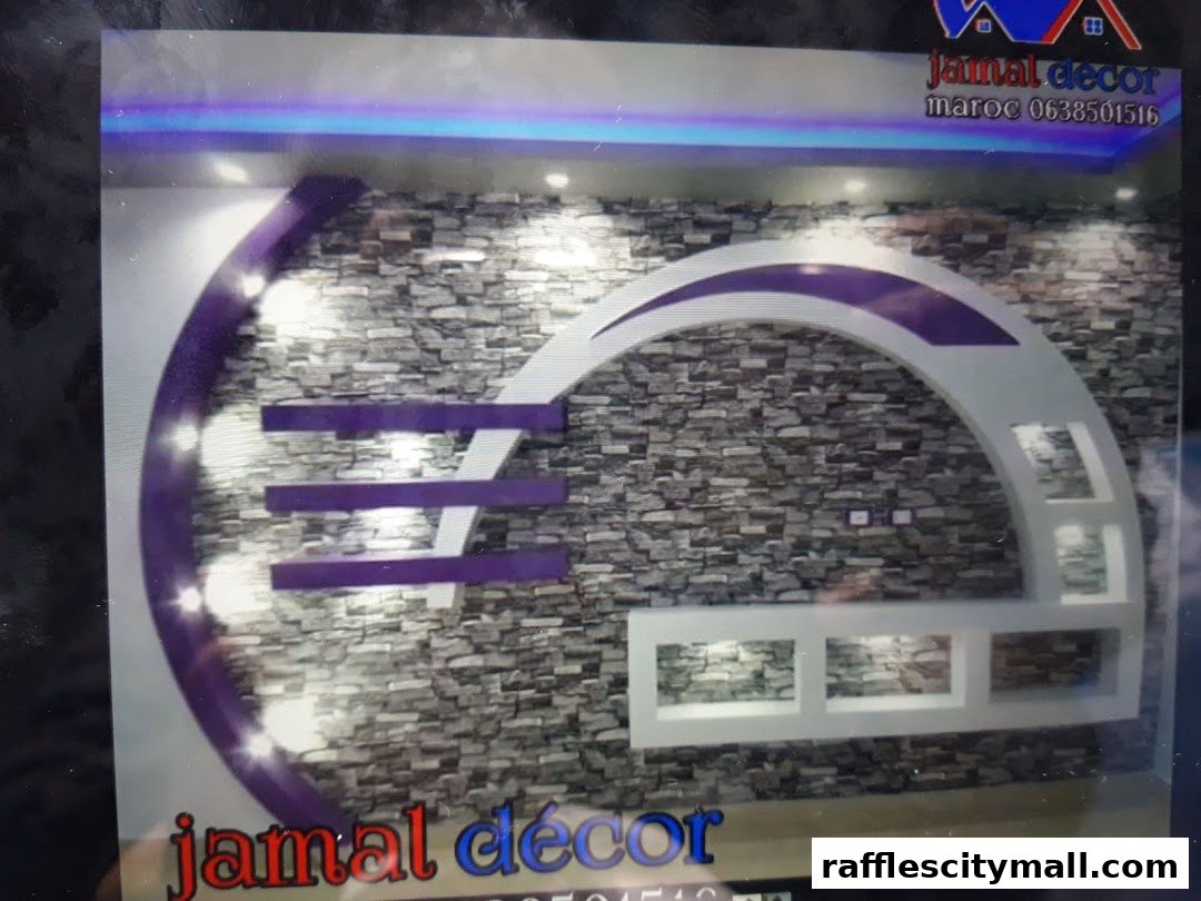 Modern interior wall design with stone texture and purple and white accents.