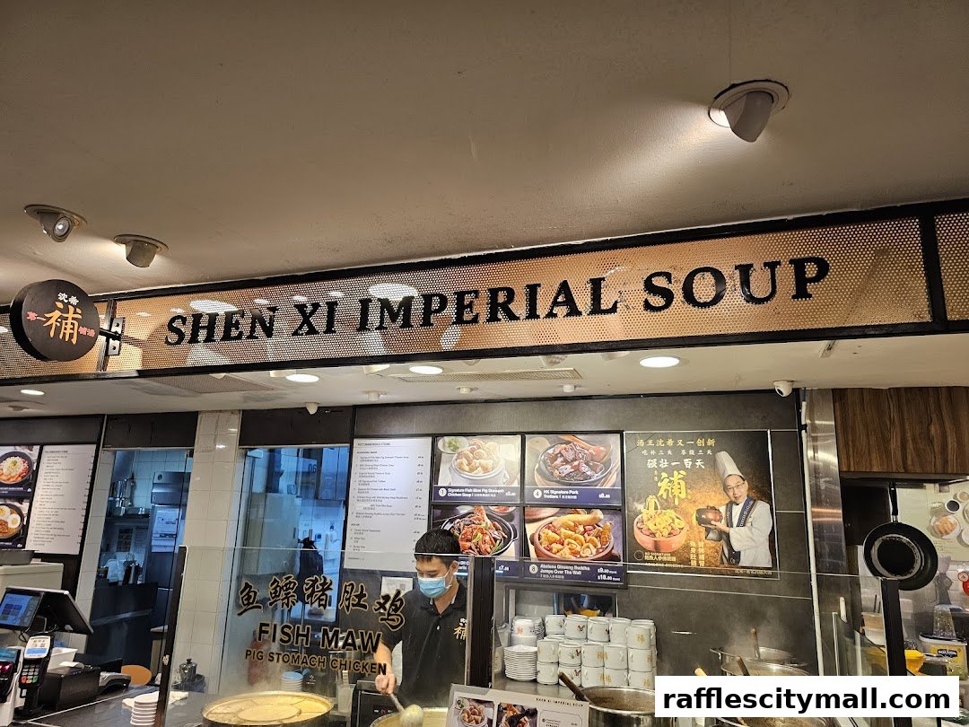 A shop counter with a sign for Shen Xi Imperial Soup and a chef preparing food.