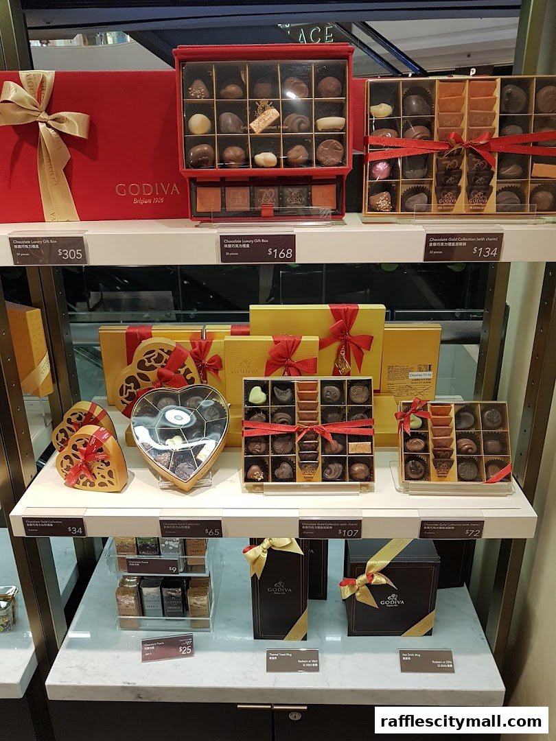 A display of Godiva chocolates in various gift boxes and packaging.