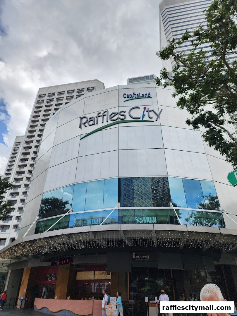 The Raffles City building with a prominent CapitaLand and Raffles City logo.