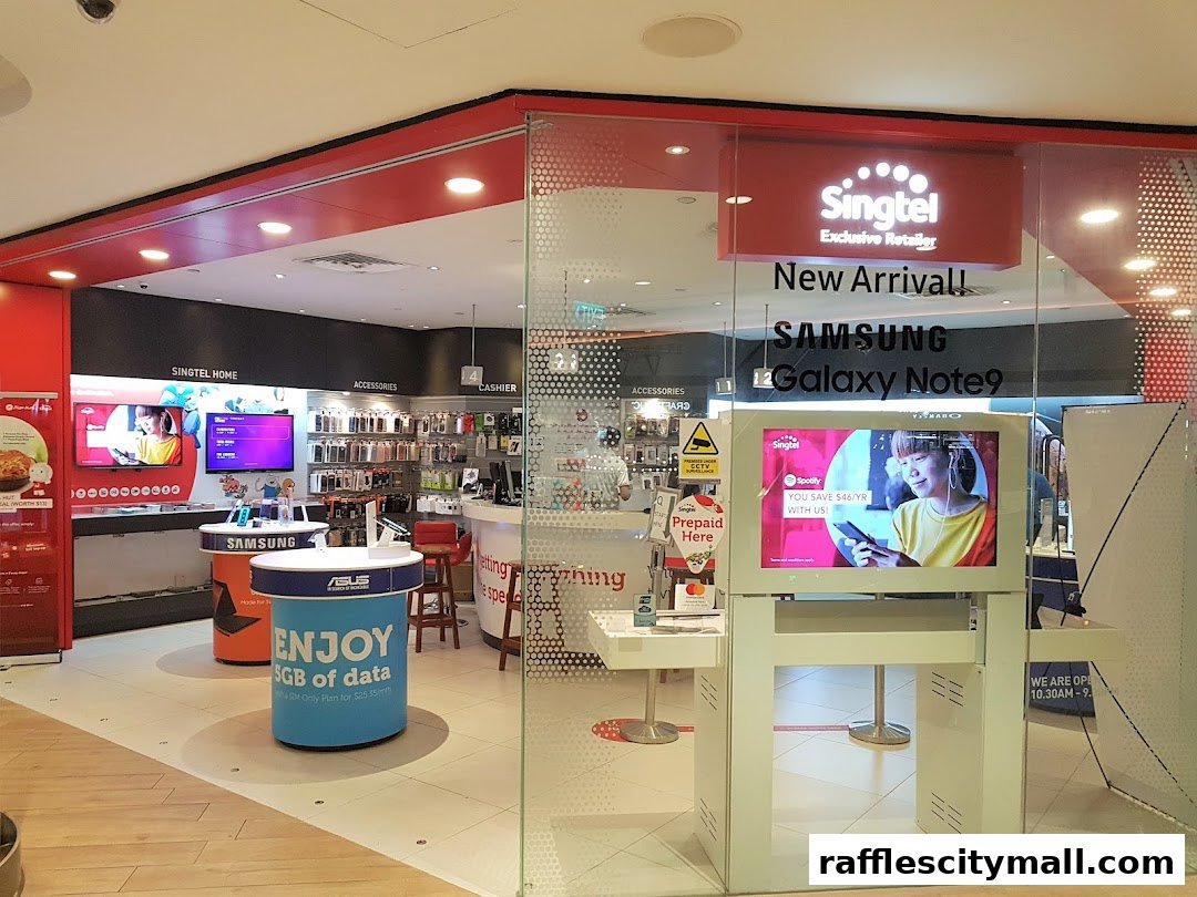 Interior view of a Singtel Exclusive Retailer shop showcasing phones and accessories.