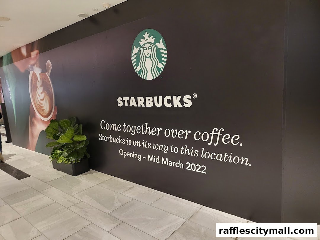 Starbucks branding and announcement for a new location opening soon.