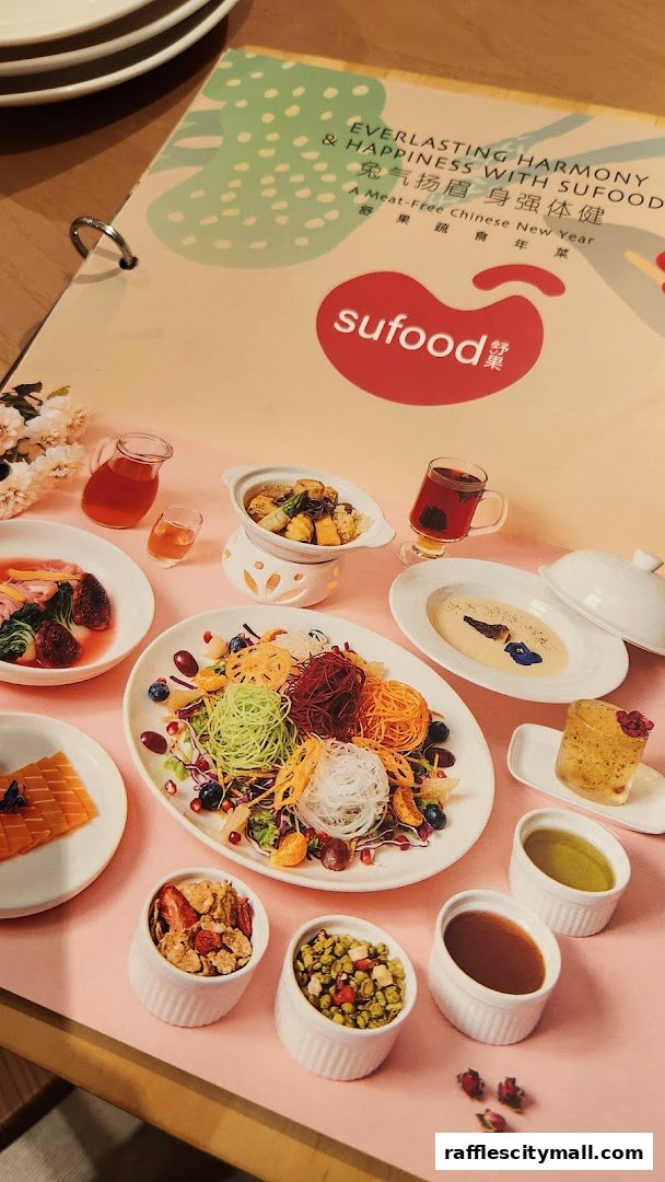 A spread of colorful and healthy meat-free dishes, including a vibrant salad and various small bowls.