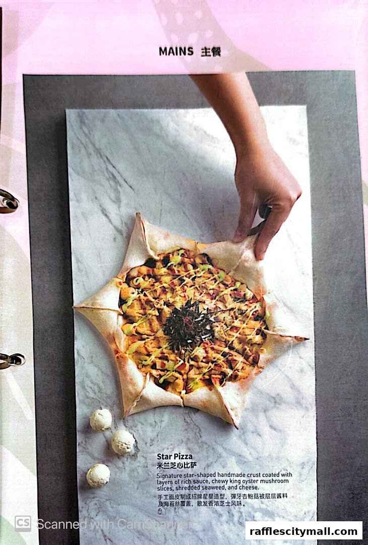 A star-shaped pizza with toppings and a description in English and Chinese.