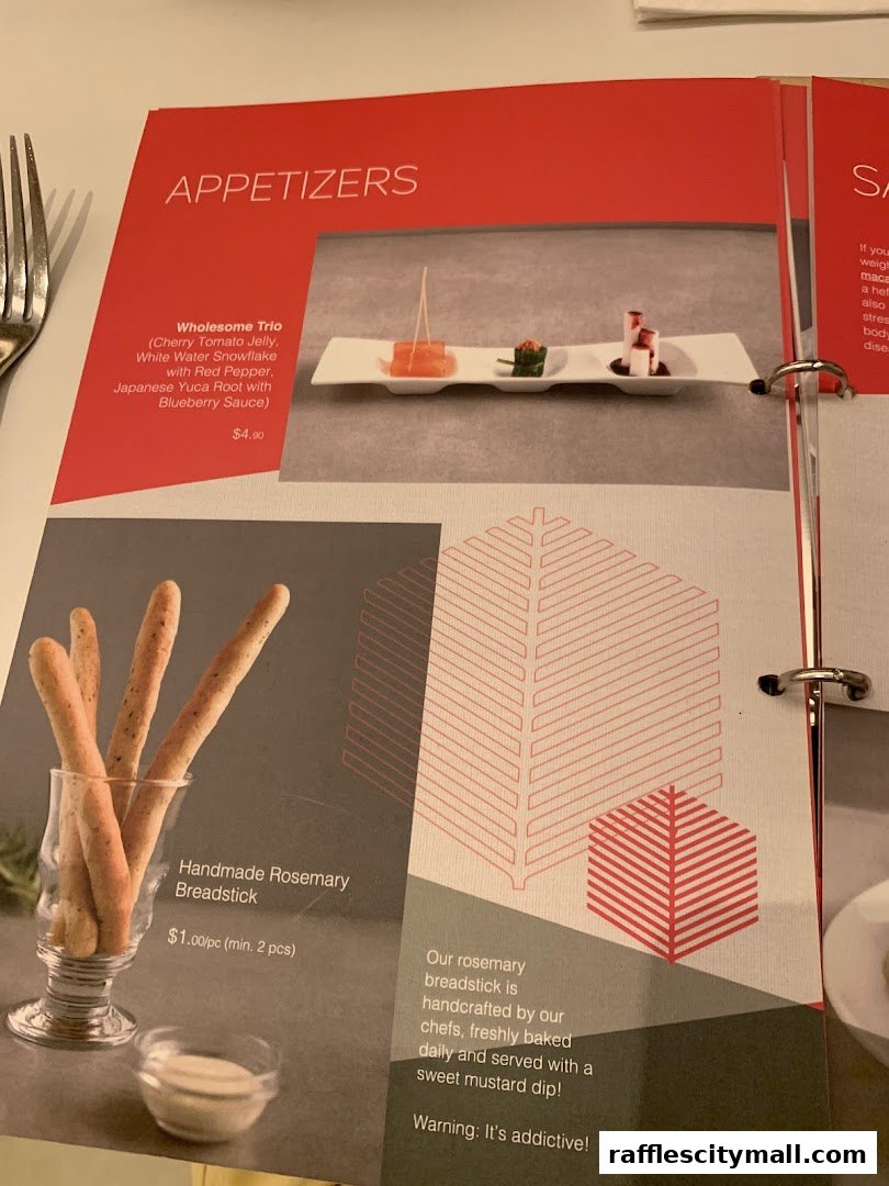 A menu page featuring appetizers like Wholesome Trio and Rosemary Breadsticks.