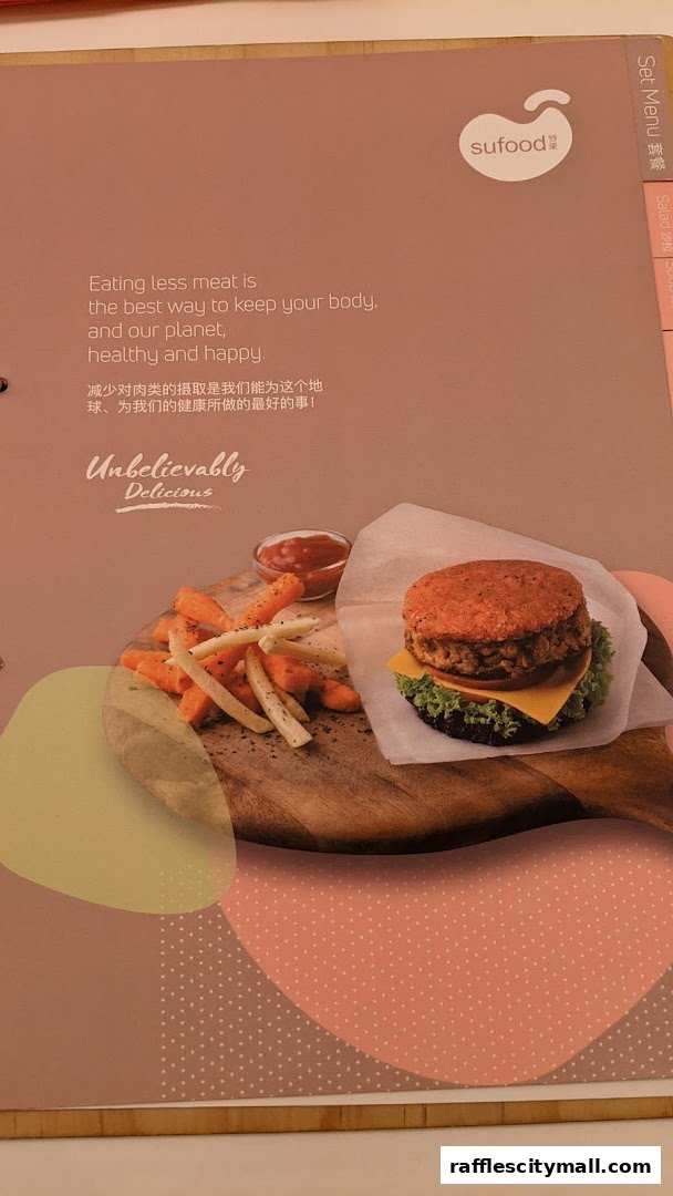 A menu page from Sufood featuring a plant-based burger and fries with a health-focused message.