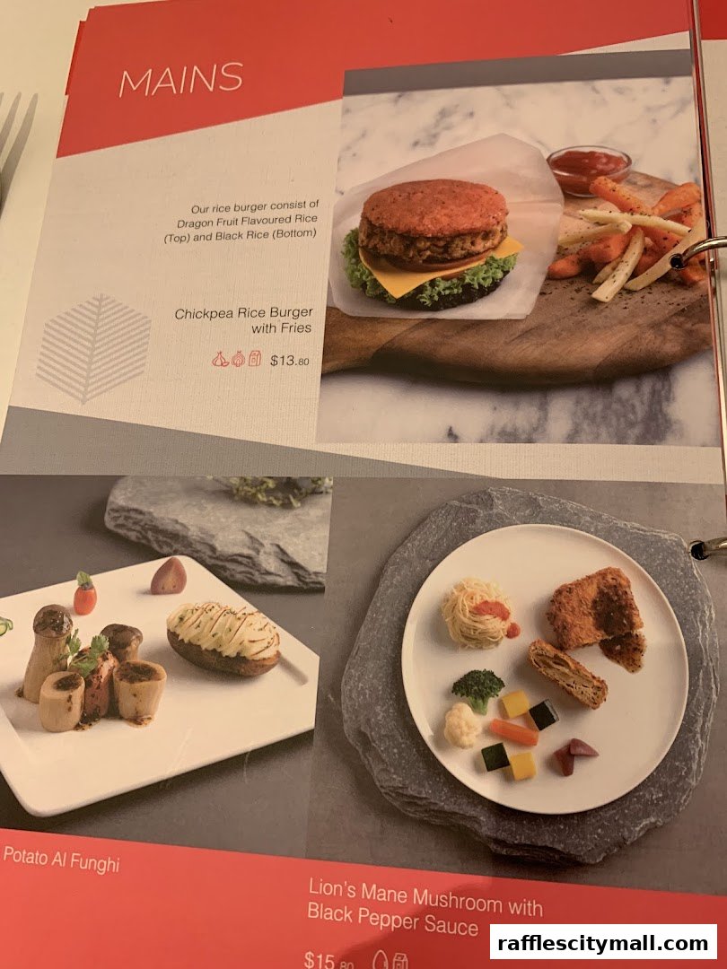 A menu featuring vegetarian mains including a chickpea rice burger and lion's mane mushroom.