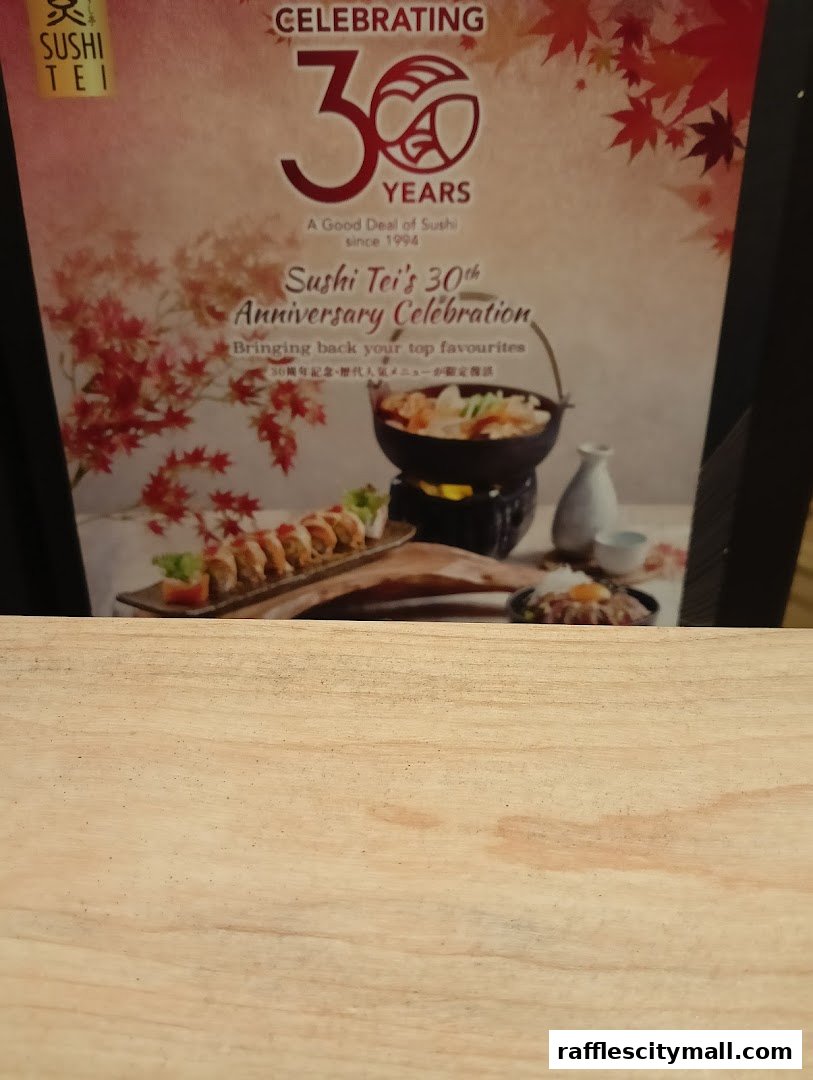 A promotional poster for Sushi Tei's 30th Anniversary Celebration featuring sushi and hot pot.